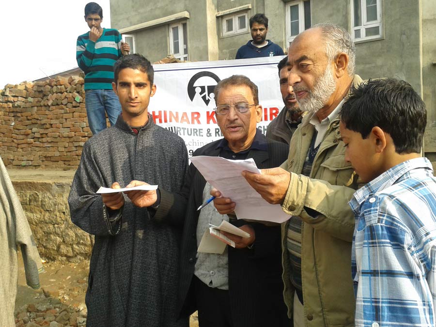 CHEQUE DISTRIBUTION AS FLOOD RELIEF IN NAI BASTI ANANTANAG
