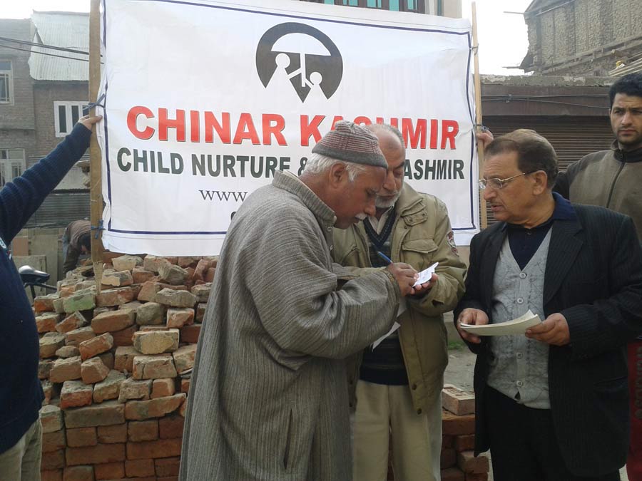 CHEQUE DISTRIBUTION AS FLOOD RELIEF IN NAI BASTI ANANTANAG