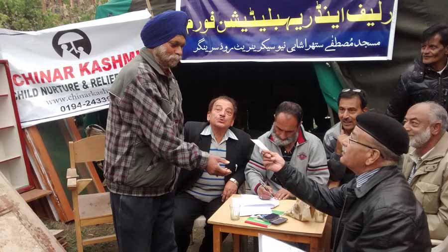 DISTRIBUTION OF FLOOD RELIEF AT MASJID MUSTAFAA SUTHRA SHAHI