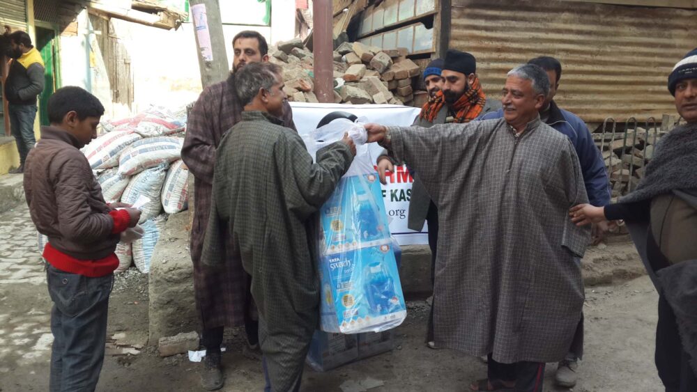 Distributing goods at Srinagar