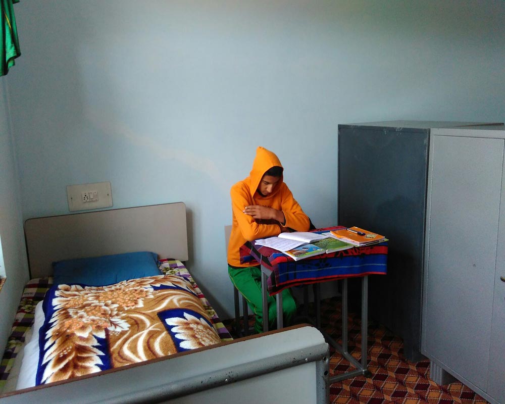 Child Studying CHINAR Home