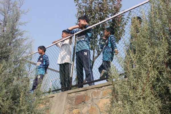 Chinar Kashmir Home Sports Day 2024 - Boys watching the game
